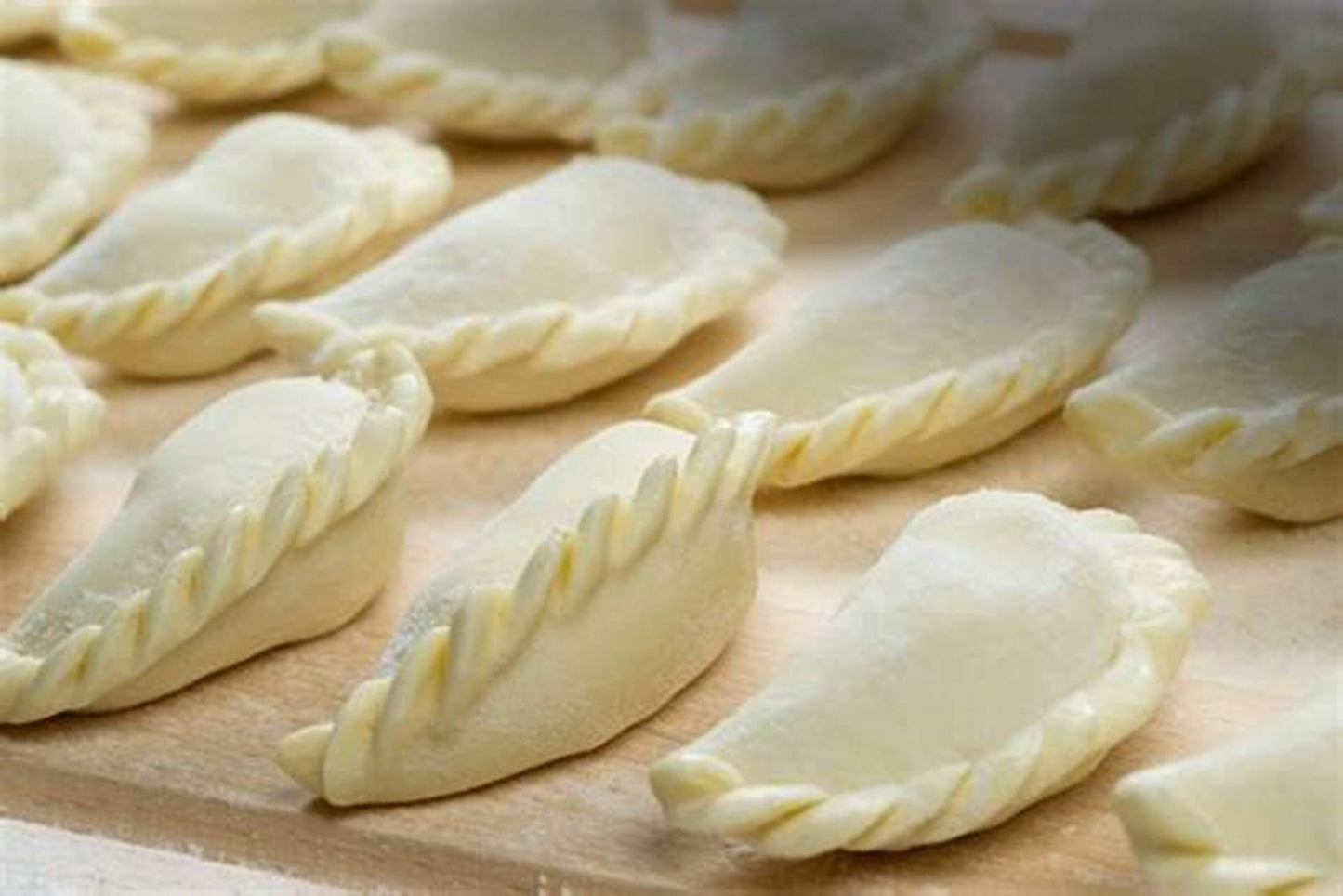 Thai Chicken Curry Puffs.       25 piece bags. $25 each.  Minimum order of x4 bags and free delivery in Auckland City