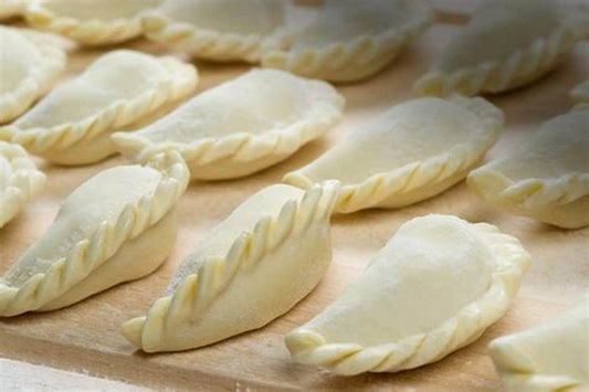 Thai Chicken Curry Puffs.       25 piece bags. $25 each.  Minimum order of x4 bags and free delivery in Auckland City